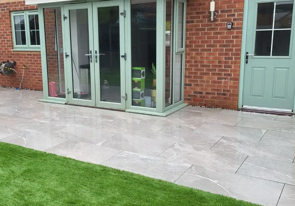 grey porcelain patio installation in corby